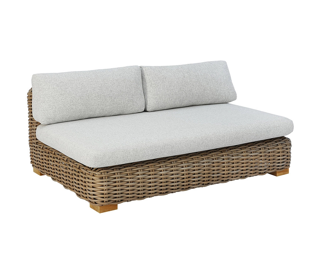 A two-seater wicker daybed with light gray textured cushions, shown from a three-quarter angle on a solid white background.