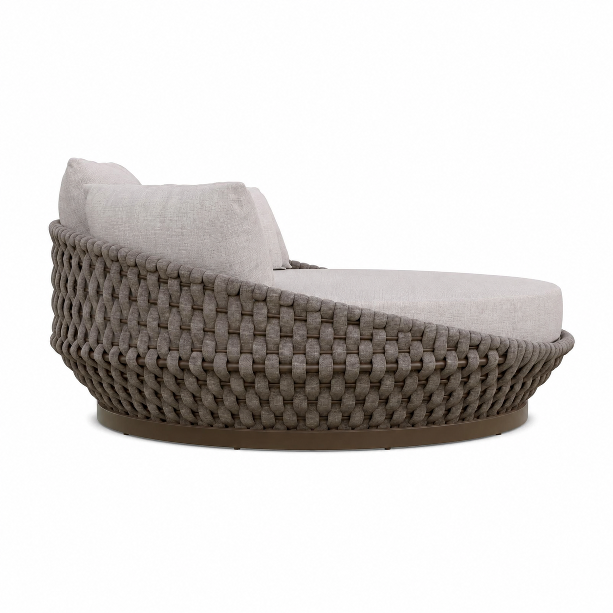 A modern oval outdoor daybed with a woven taupe-brown wicker frame, light gray cushions, and a matching round base, shown against a plain white background.