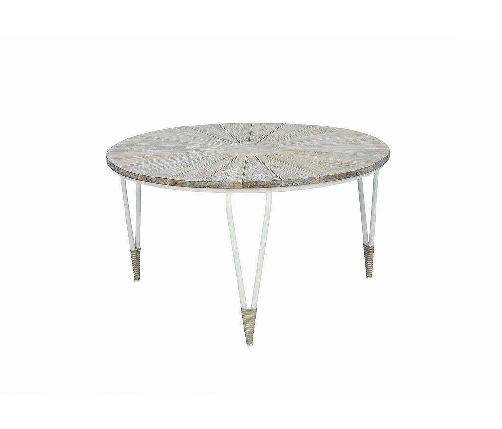 A round dining table with a light gray wood top featuring a radial sunburst pattern and white metal legs with pointed silver tips, shown on a plain white background.
